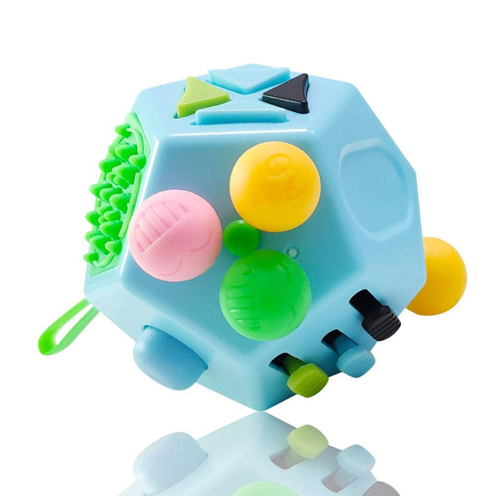 Colorful fidget cube toy with multiple buttons on a white background