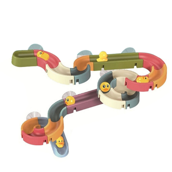 Colorful marble run toy with ducks on a white background