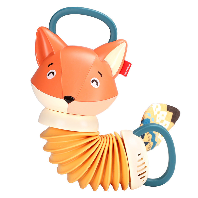 Toy fox with a blue handle on a white background